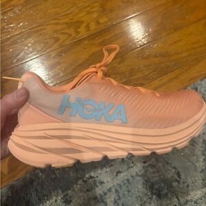 HOKAs brand new orange and blue sneakers